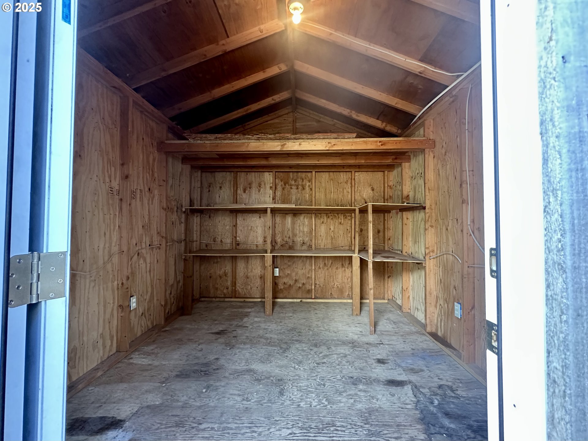 26230 Sandlake Road Cloverdale, OR 97112 - Photo 41 of 44 a view of an empty room with cabinet