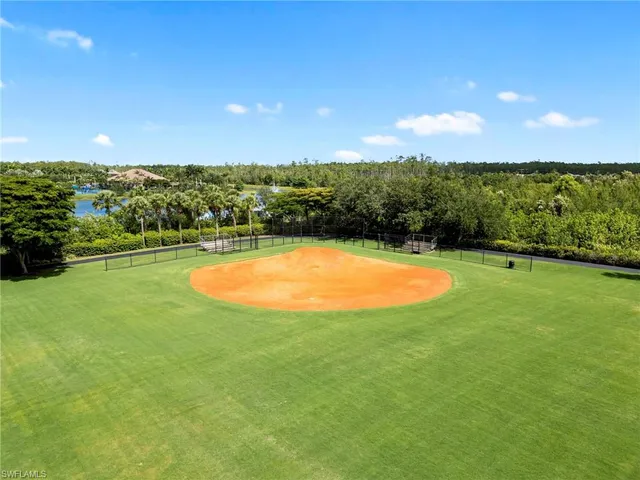 a view of a swimming pool and an outdoor space