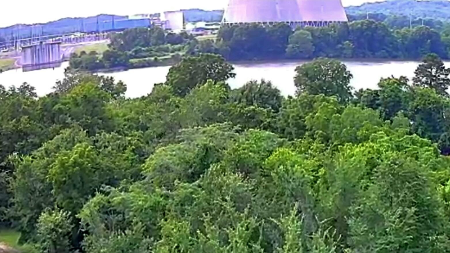 6227 River Road Decatur, TN 37322 - Photo 2 of 19 a view of a lake with a building in the background