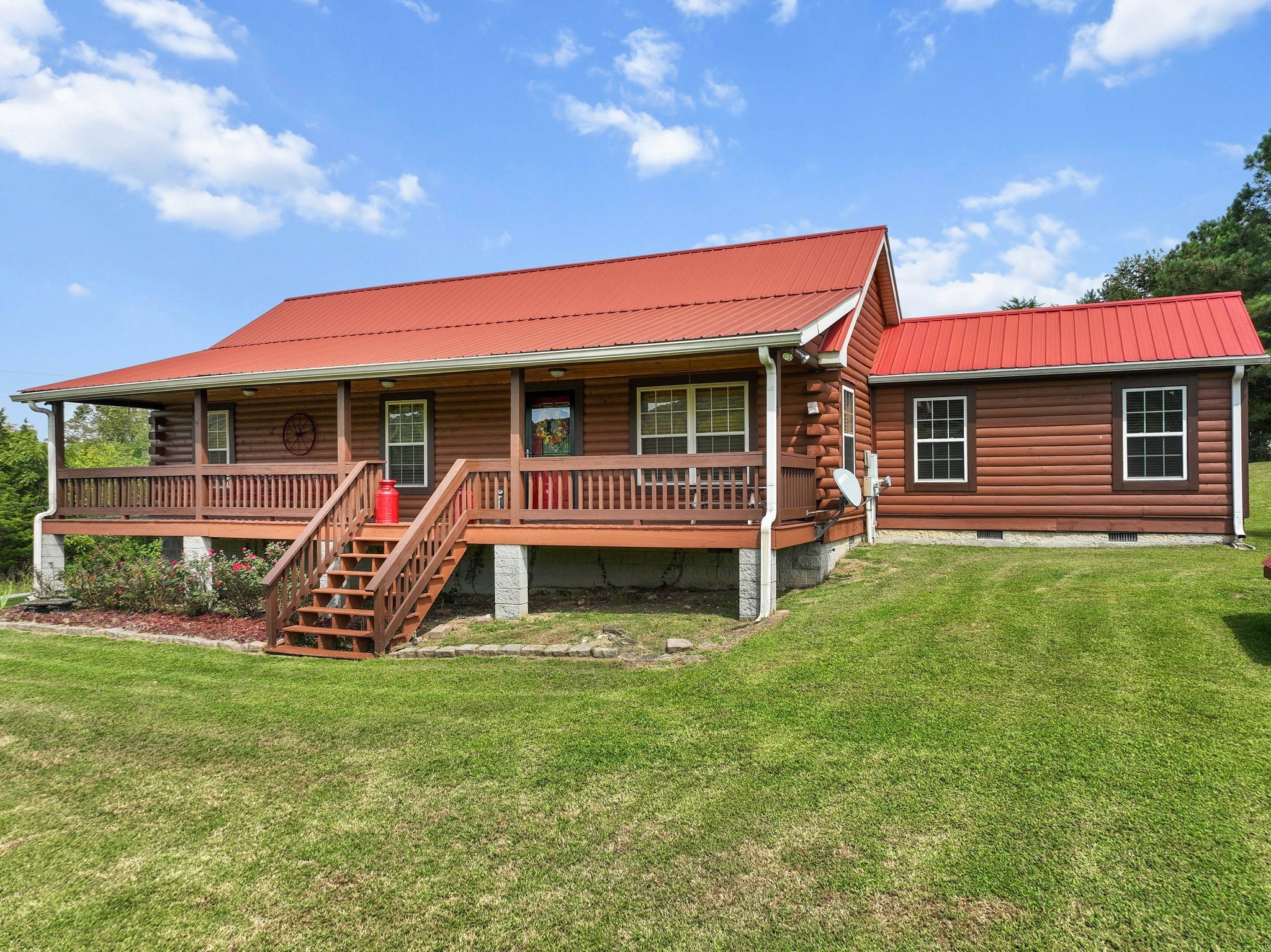 2301 Turner Road Watertown, TN 37184 - Photo 1 of 65 a front view of a house with garden