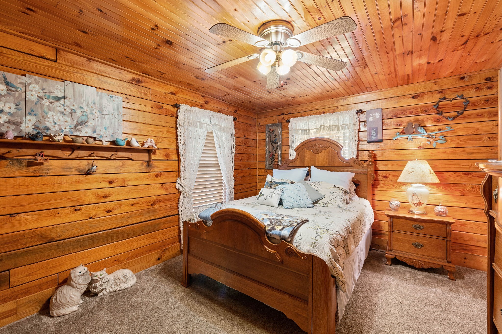 2301 Turner Road Watertown, TN 37184 - Photo 25 of 65 a bedroom with a bed and a chandelier