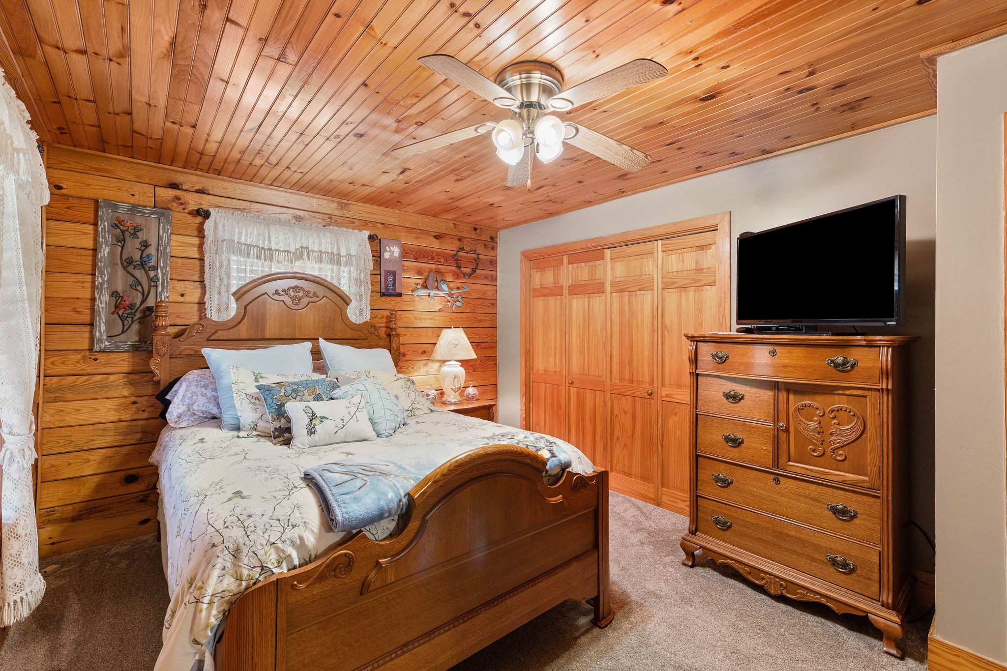 2301 Turner Road Watertown, TN 37184 - Photo 26 of 65 a bedroom with a bed and a flat tv screen on dresser