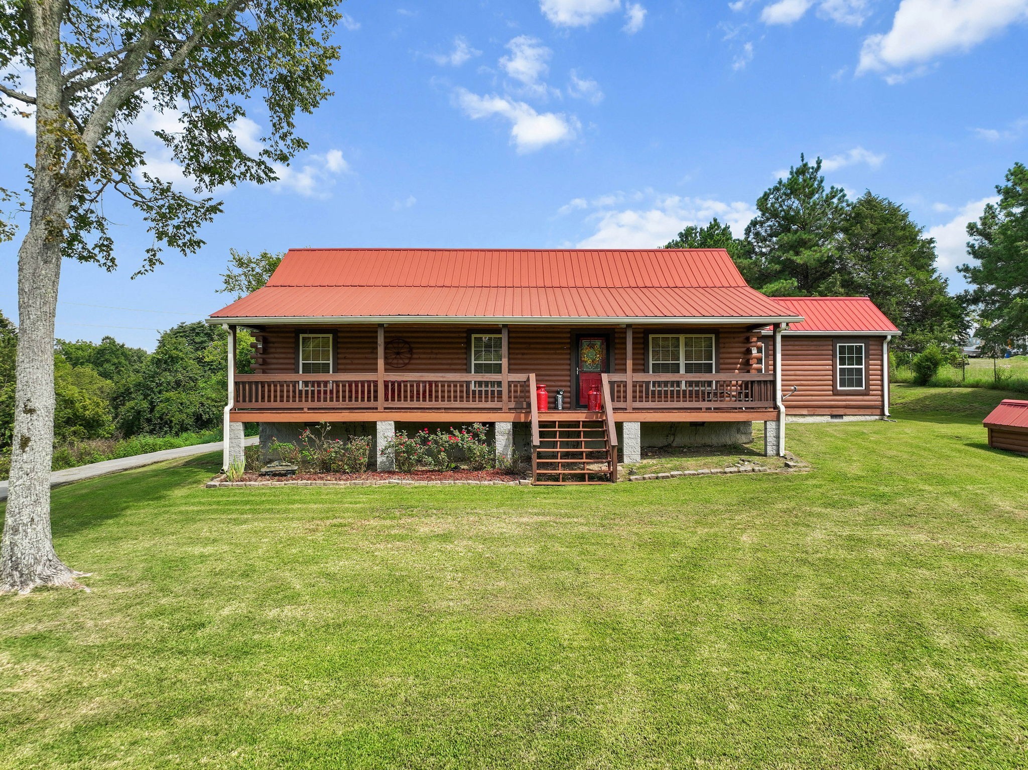 2301 Turner Road Watertown, TN 37184 - Photo 3 of 65 a front view of a house with garden