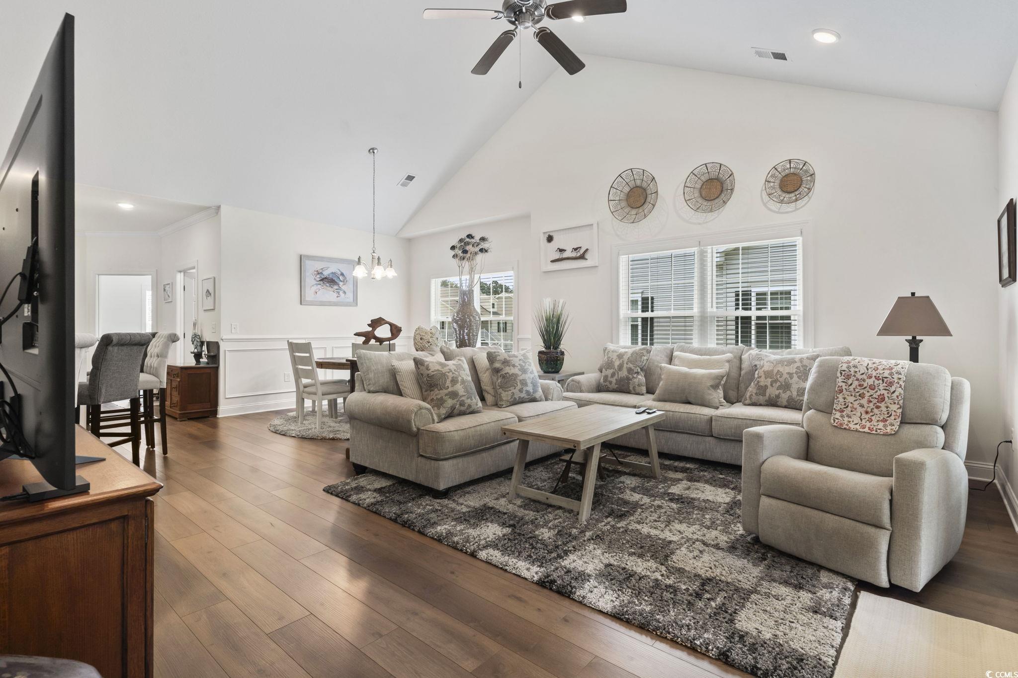 924 Jackline Place, Unit 201 Murrells Inlet, SC 29576 - Photo 15 of 35 Living area featuring high vaulted ceiling, dark wood finished floors, recessed lighting, and ceiling fan