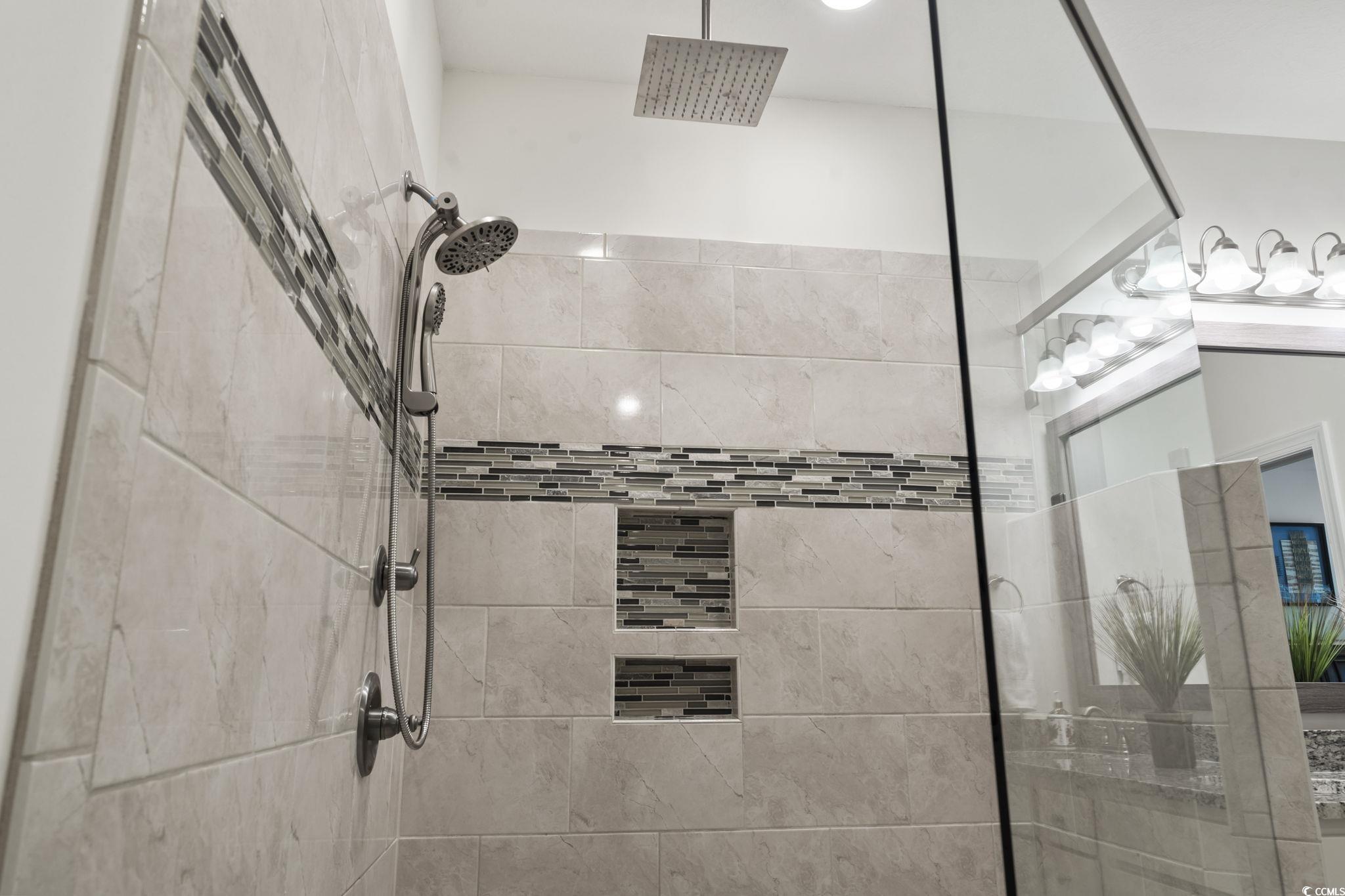 924 Jackline Place, Unit 201 Murrells Inlet, SC 29576 - Photo 28 of 35 Full bath with a tile shower