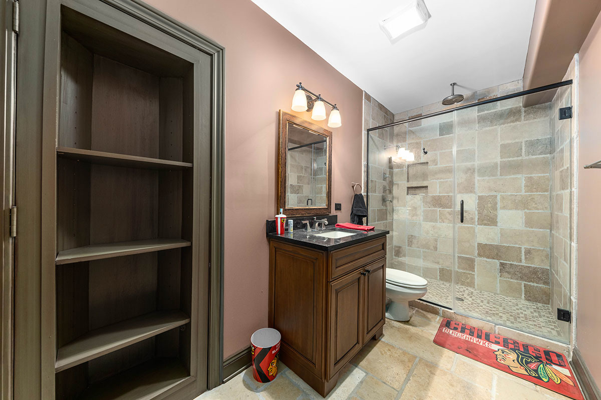 980 Deerpath Road North Aurora, IL 60542 - Photo 54 of 70 a bathroom with a sink and a mirror