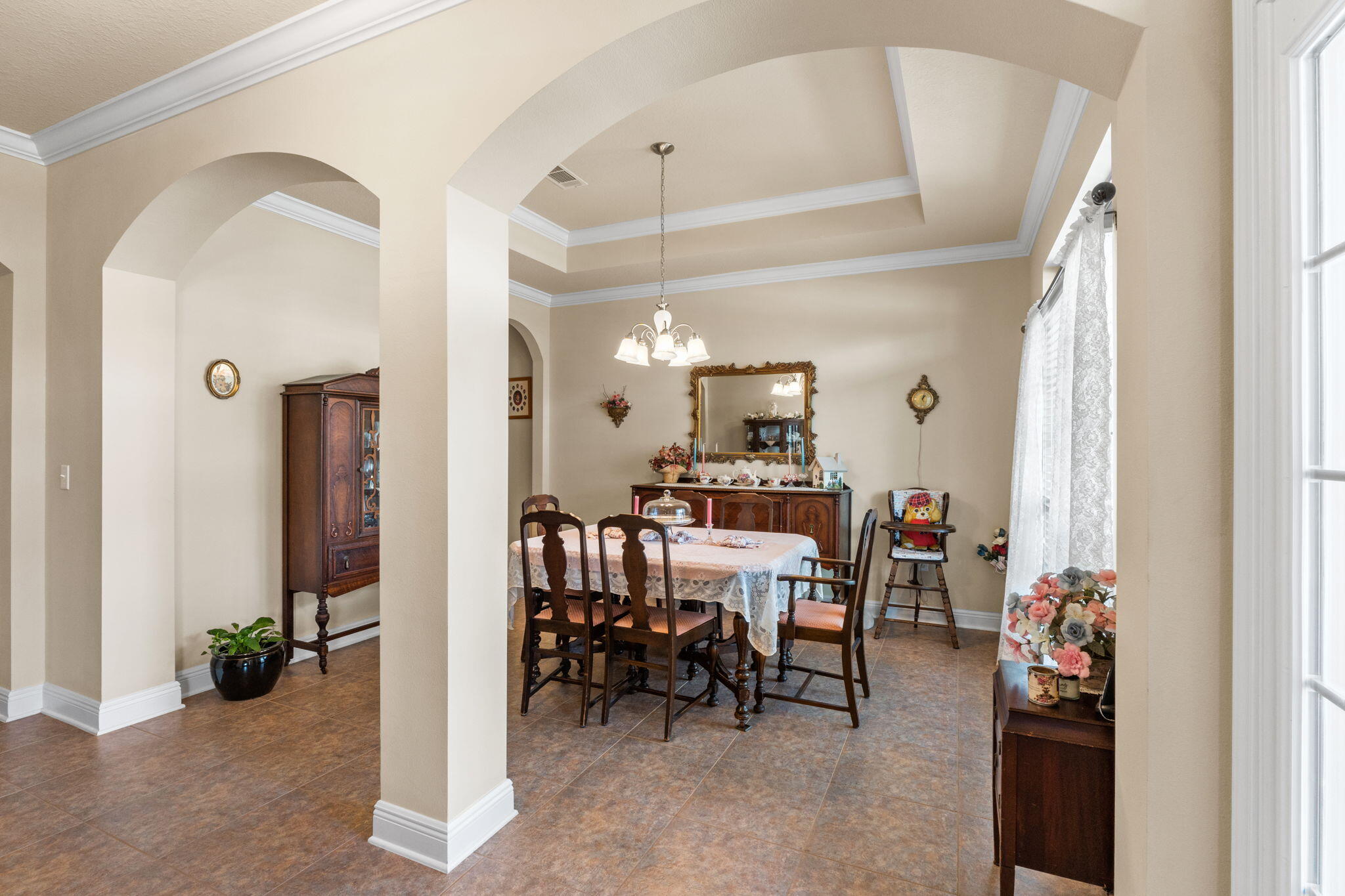 67 Secret Street Freeport, FL 32439 - Photo 13 of 63 a view of a dining room with furniture and a potted plant