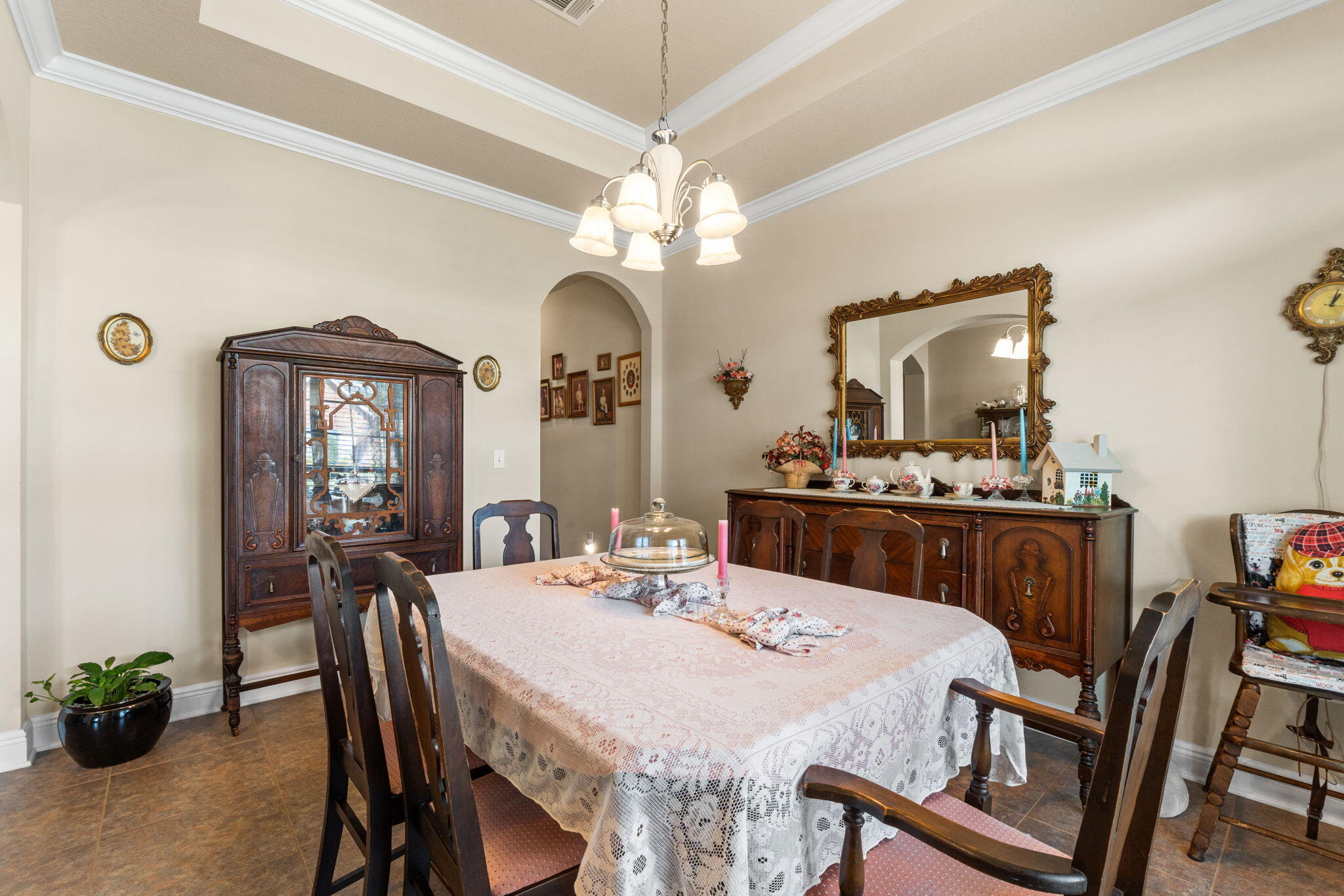 67 Secret Street Freeport, FL 32439 - Photo 14 of 63 a view of a dining room with furniture and a chandelier fan