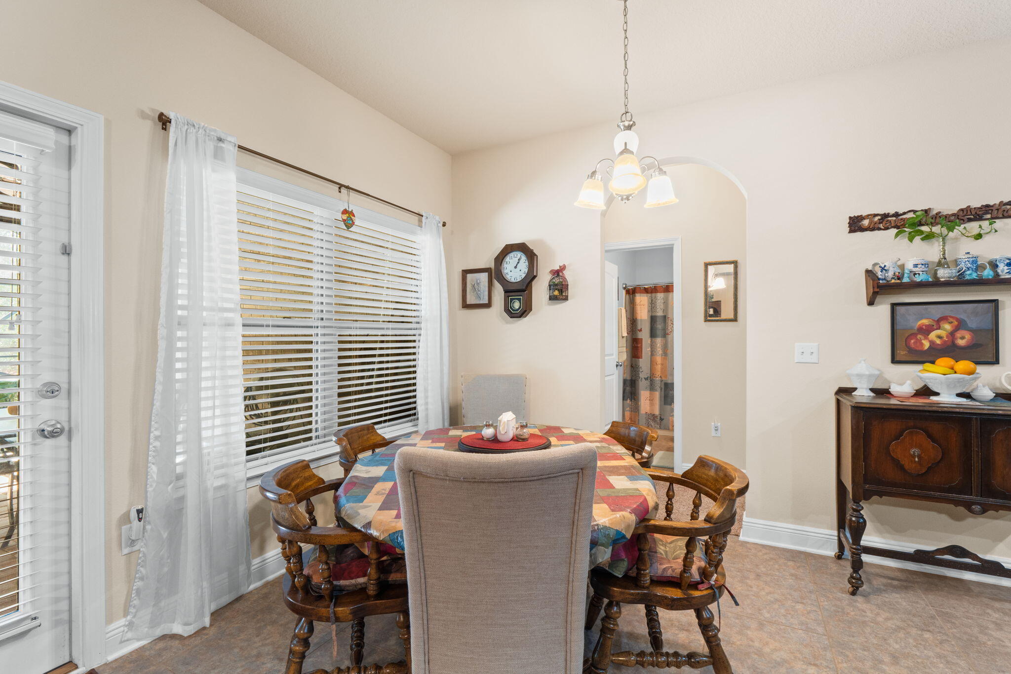 67 Secret Street Freeport, FL 32439 - Photo 24 of 63 a dining room with furniture and window