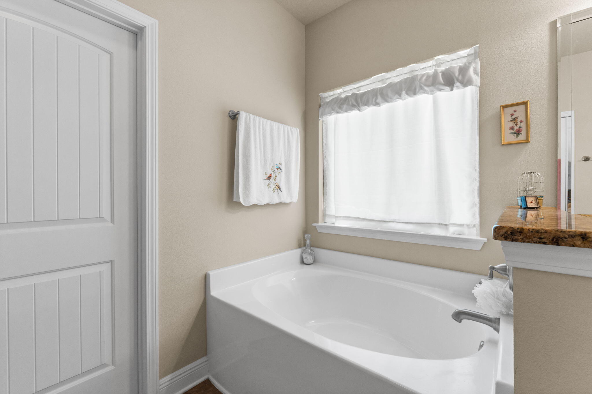 67 Secret Street Freeport, FL 32439 - Photo 43 of 63 a white bath tub sitting next to a white sink