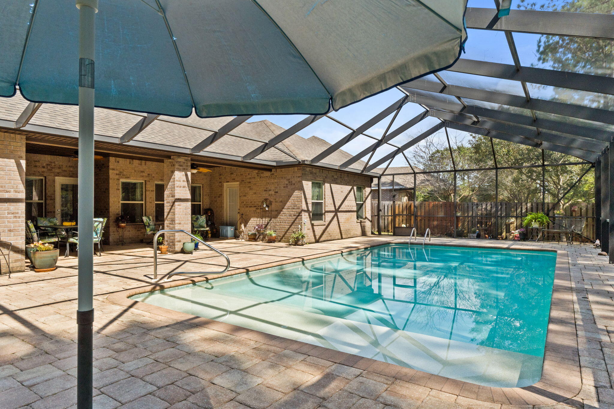 67 Secret Street Freeport, FL 32439 - Photo 53 of 63 a view of a swimming pool with a patio