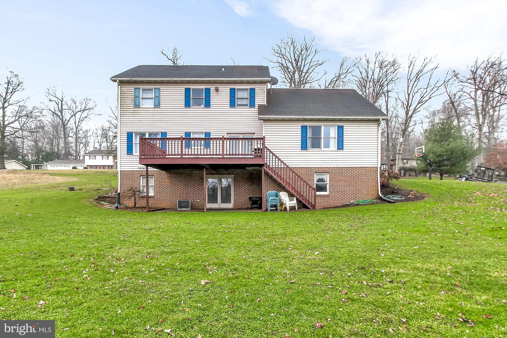 30 Blackburn Road Quarryville, PA 17566 - Photo 22 of 22 rear view of large deck and lower level walk out