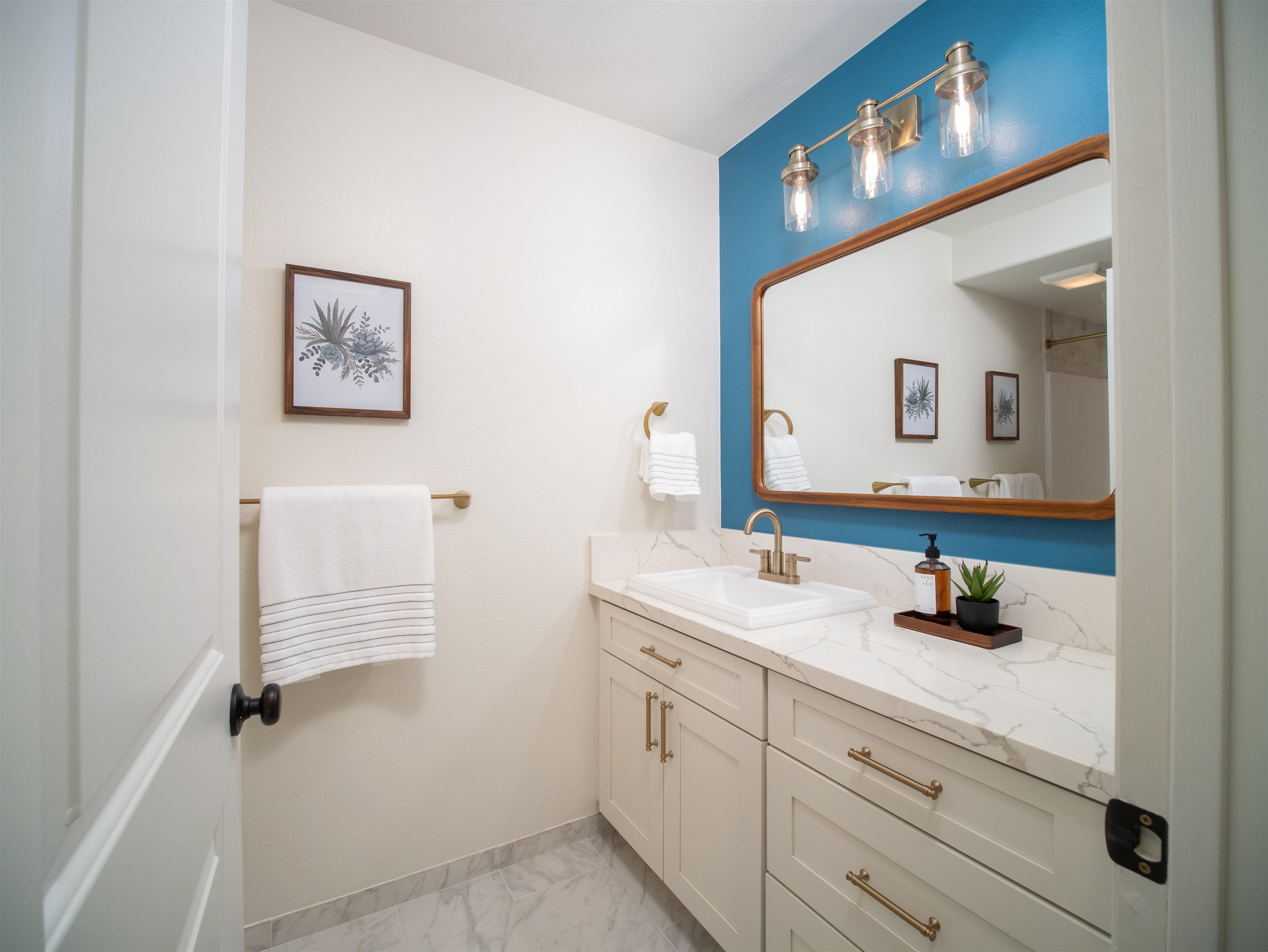 50 Eono Place Haiku, HI 96708 - Photo 35 of 50 a bathroom with a sink and a mirror