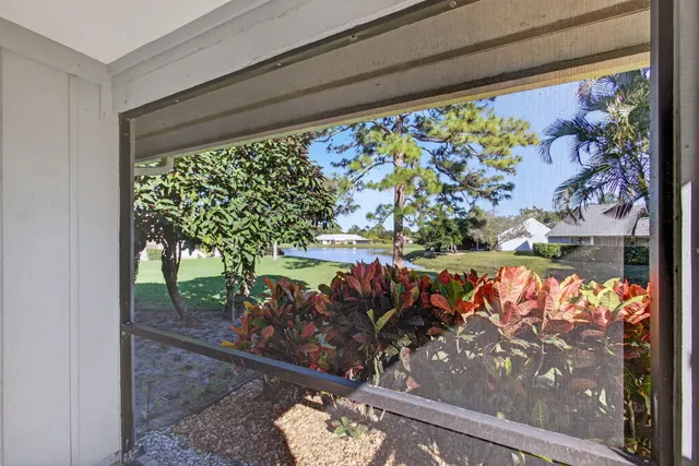 a view of a porch with a bench