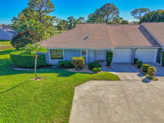 a view of a back yard of the house