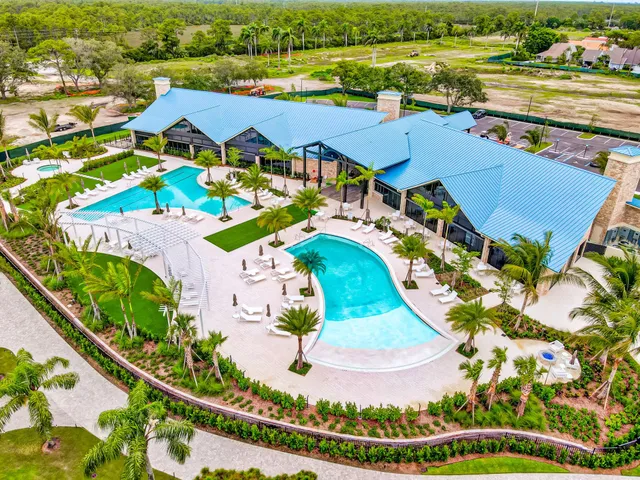a view of an chairs and table on the patio