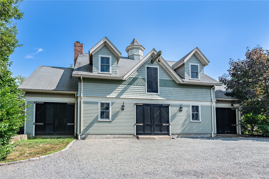 1076 East Shore Road Jamestown, RI 02835 - Photo 40 of 50 Back of carriage house with 3 additional garage bays.