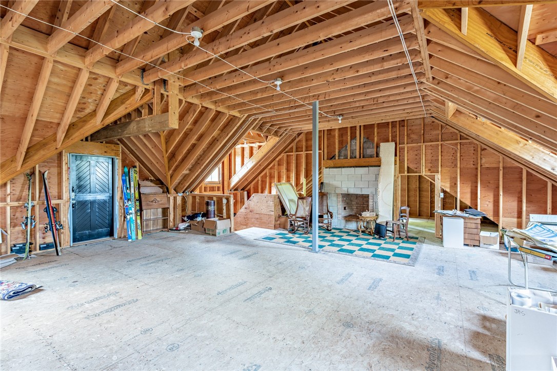 1076 East Shore Road Jamestown, RI 02835 - Photo 41 of 50 Second floor of carriage house. Fireplace and unfinished space for your own design ideas.