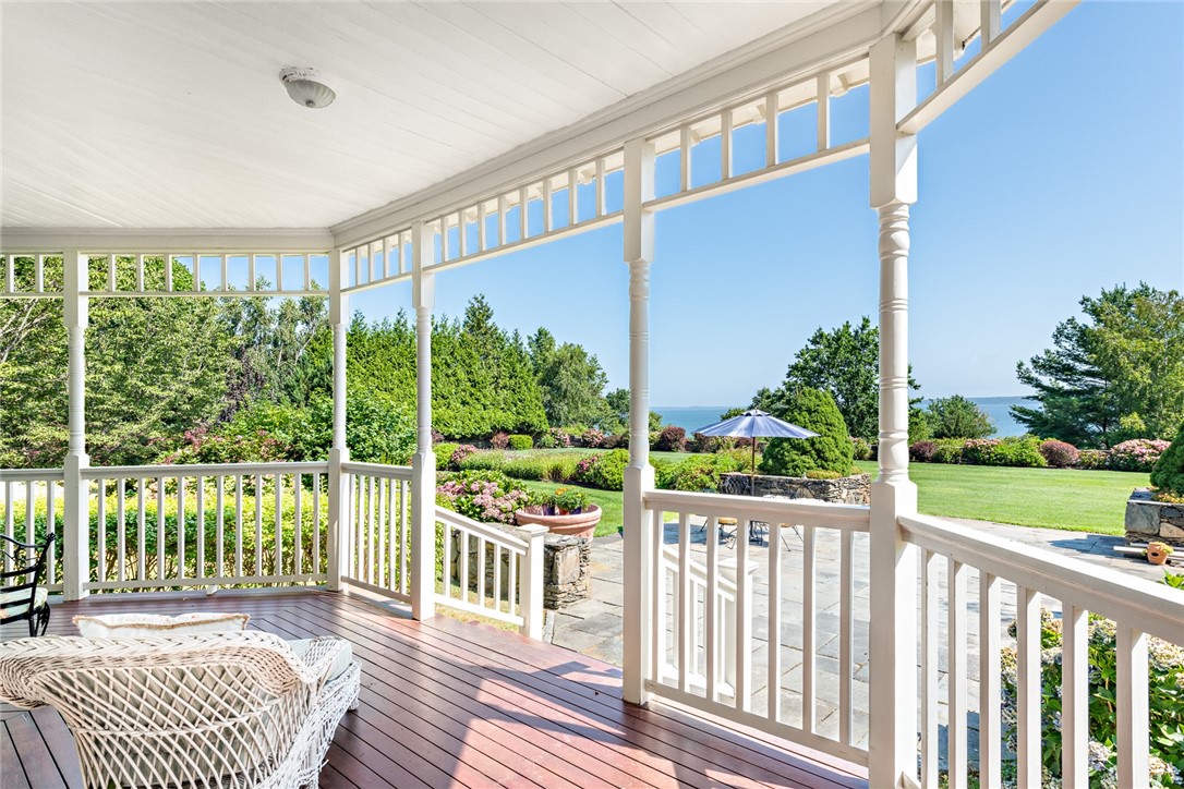 1076 East Shore Road Jamestown, RI 02835 - Photo 7 of 50 Wrap around porch with water views.