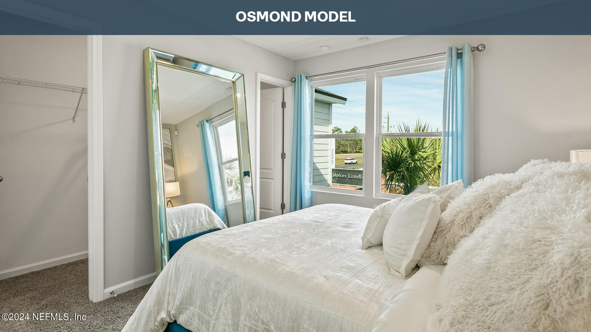 170 Palmetto Rdg Road St. Augustine, FL 32095 - Photo 22 of 36 a bed sitting in a bedroom next to a window