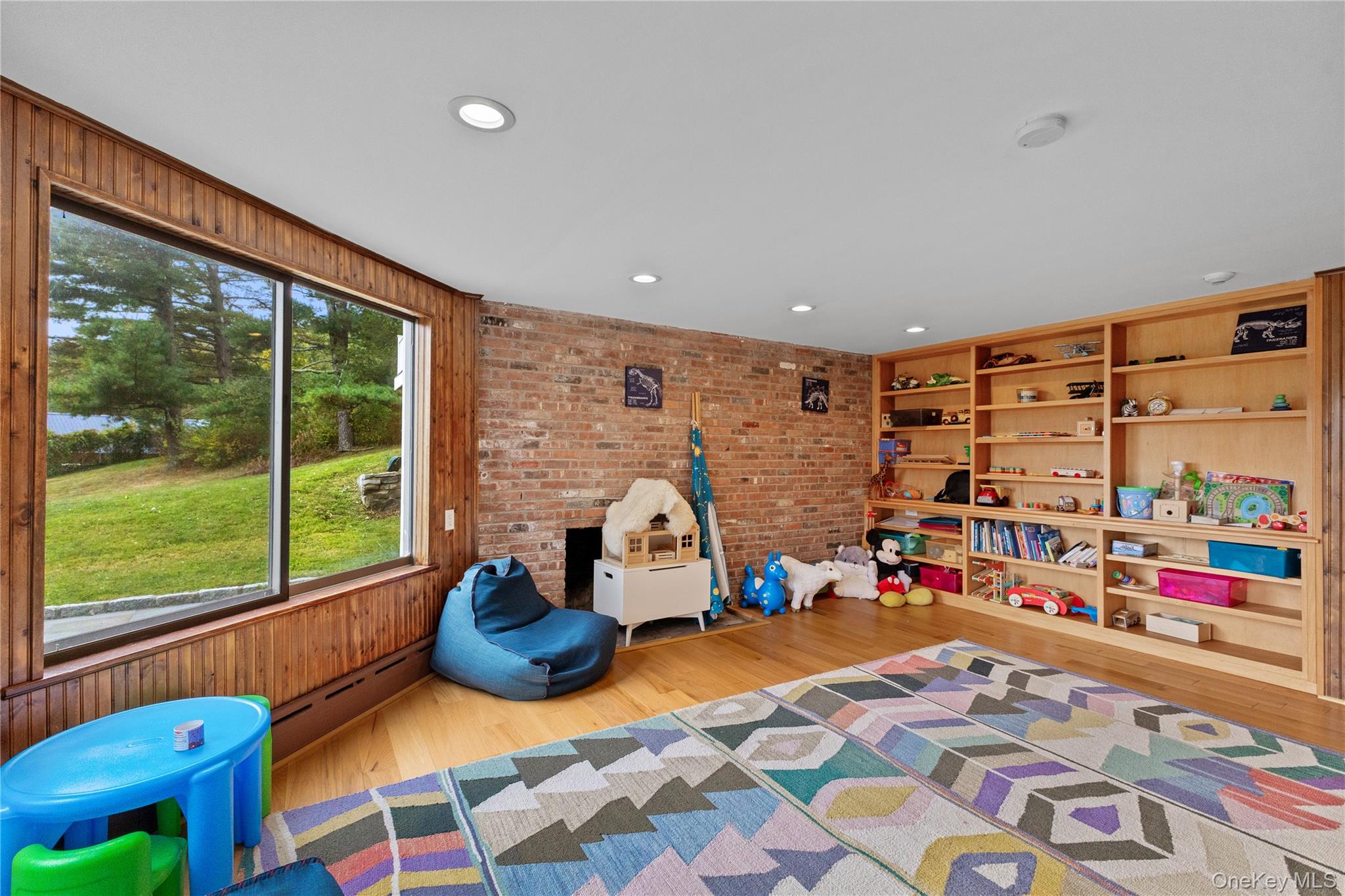 898 Gipsy Trail Road Carmel, NY 10512 - Photo 27 of 42 a bedroom with furniture and a large window