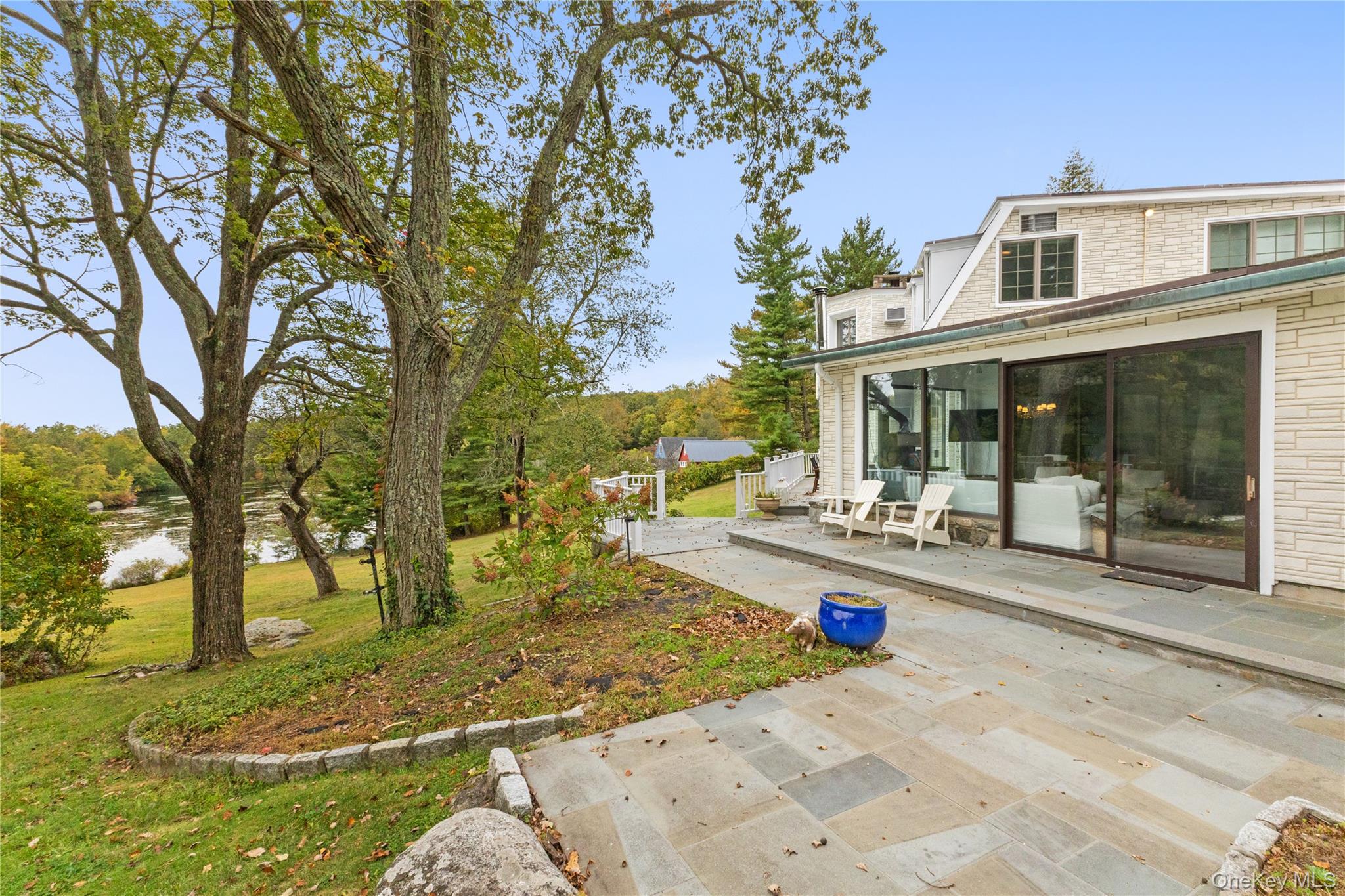 898 Gipsy Trail Road Carmel, NY 10512 - Photo 29 of 42 a view of a house with backyard and sitting area