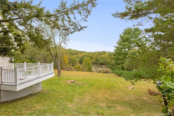 a view of a large body of water with water fall