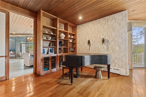 a view of a livingroom with furniture and window