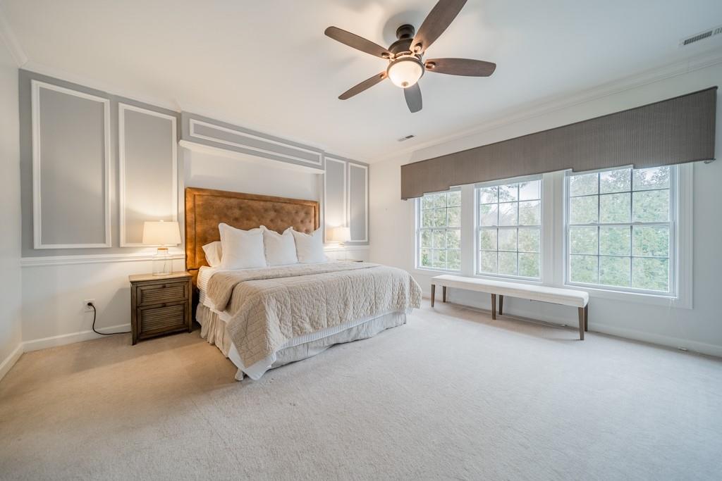 7604 Birchwalk Drive Huntersville, NC 28078 - Photo 23 of 37 a spacious bedroom with a bed and a window