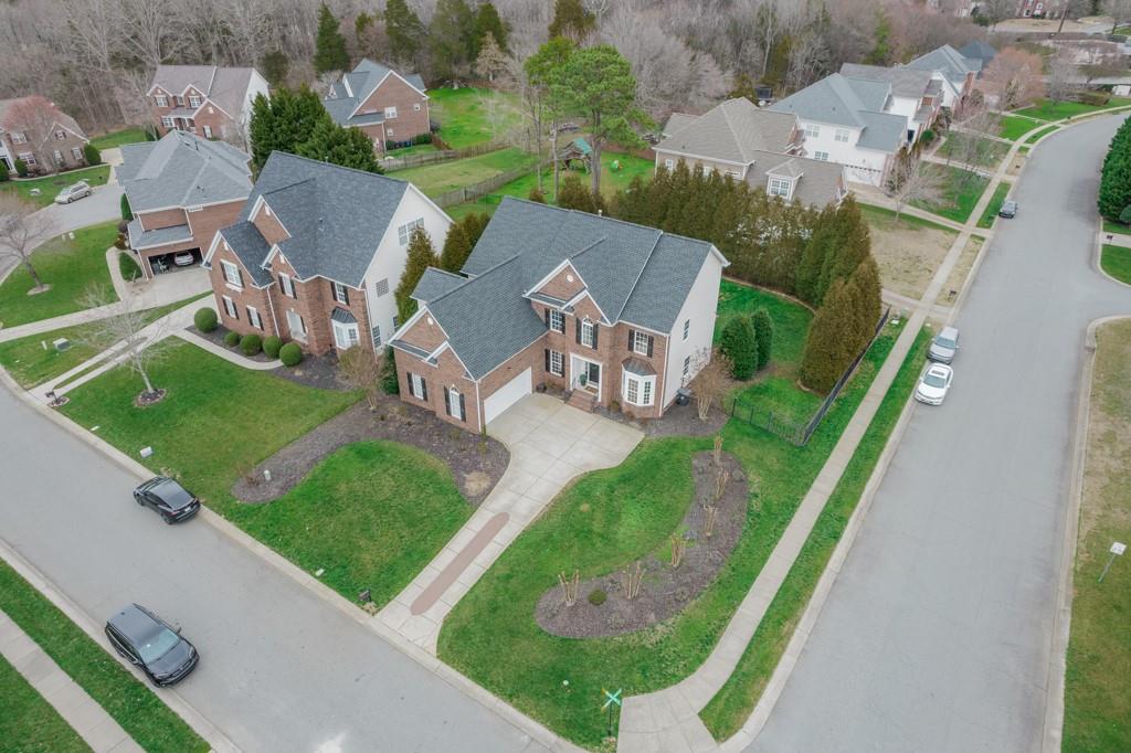 7604 Birchwalk Drive Huntersville, NC 28078 - Photo 33 of 37 an aerial view of a house with a garden and trees