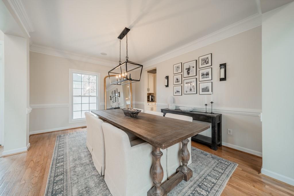 7604 Birchwalk Drive Huntersville, NC 28078 - Photo 6 of 37 a view of a kitchen area with furniture and wooden floor