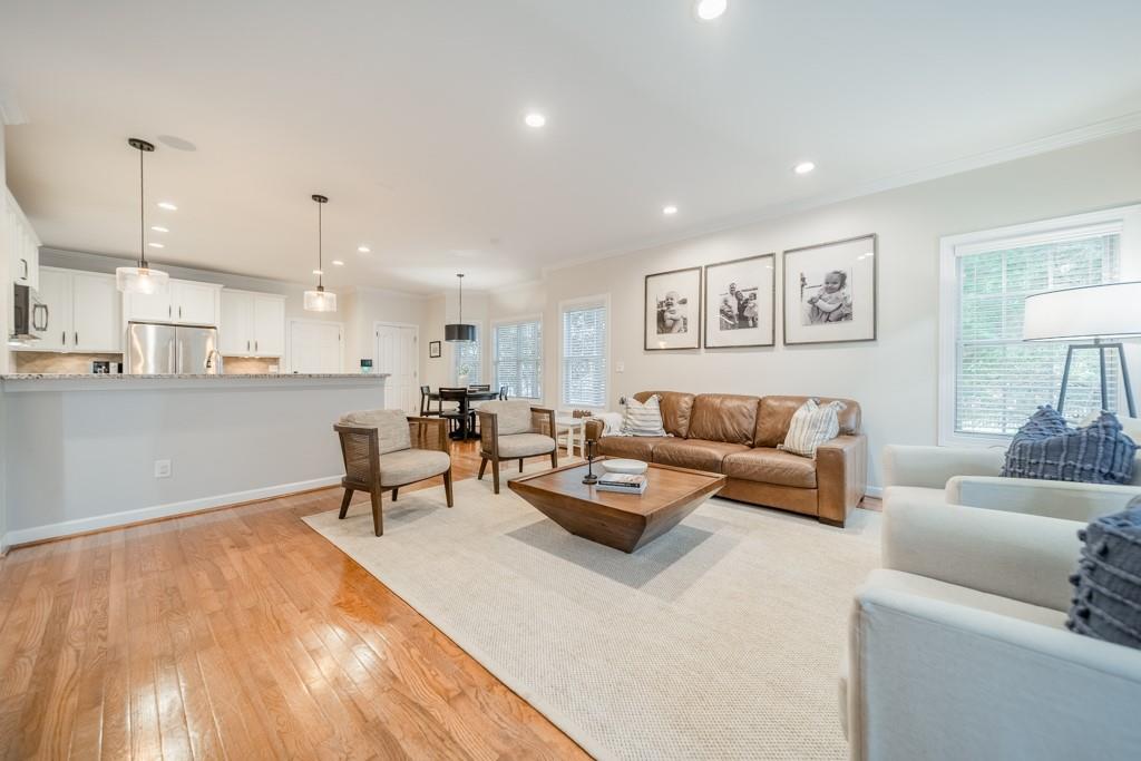7604 Birchwalk Drive Huntersville, NC 28078 - Photo 10 of 37 a living room with furniture and a wooden floor