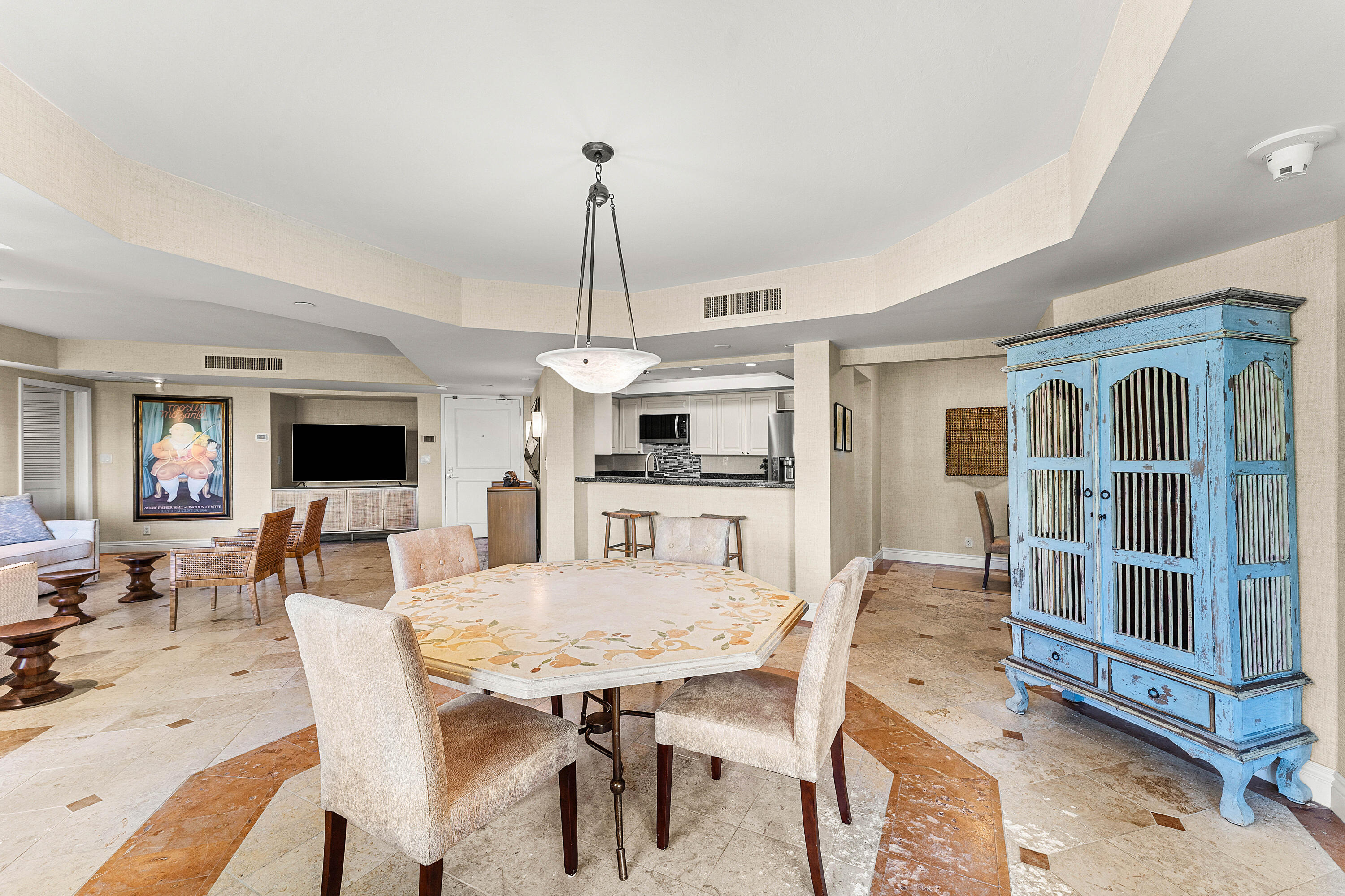 100 Southeast 5th Avenue, Unit 410 Boca Raton, FL 33432 - Photo 13 of 63 a view of a dining room with furniture