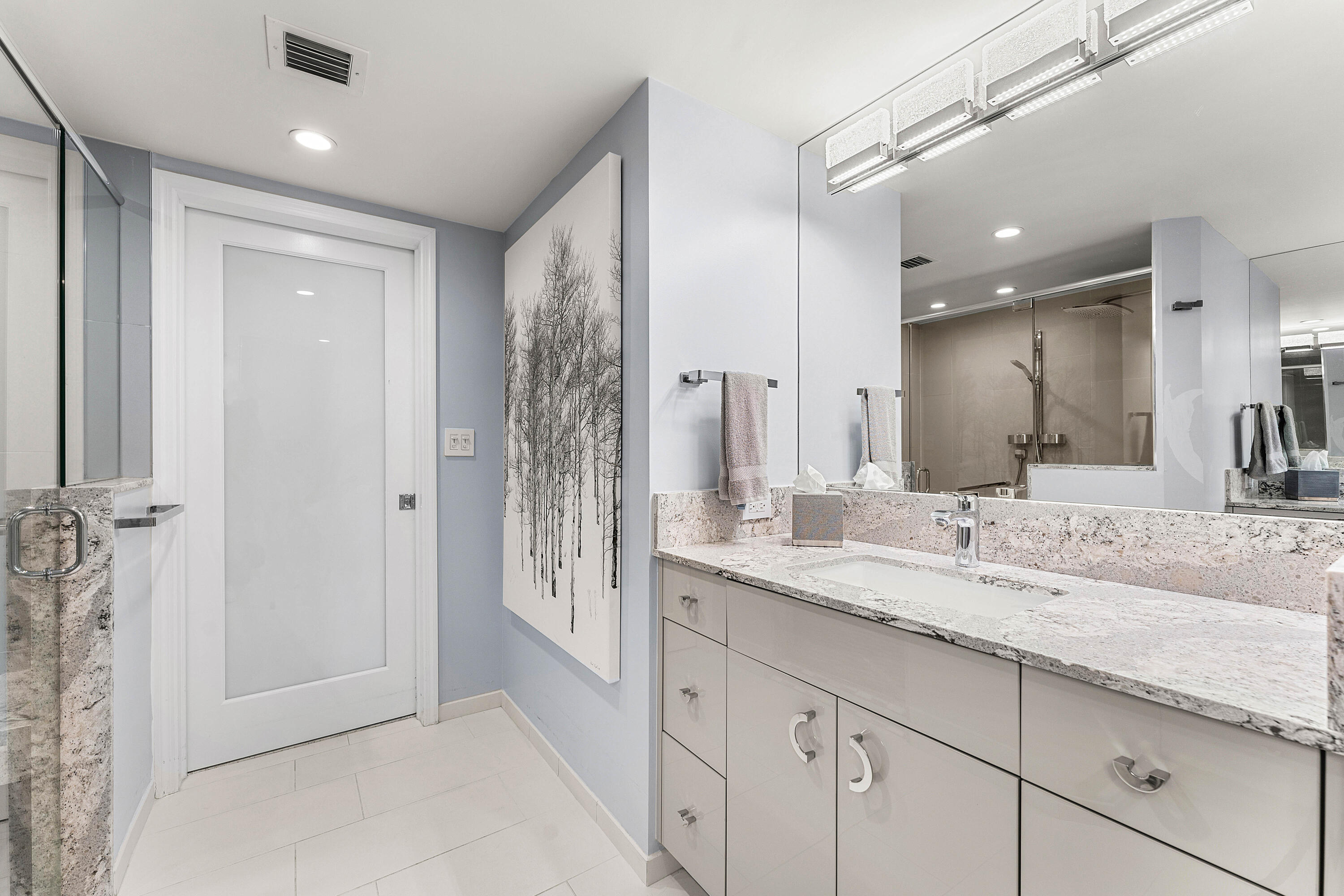 100 Southeast 5th Avenue, Unit 410 Boca Raton, FL 33432 - Photo 26 of 63 a bathroom with a granite countertop sink mirror and double