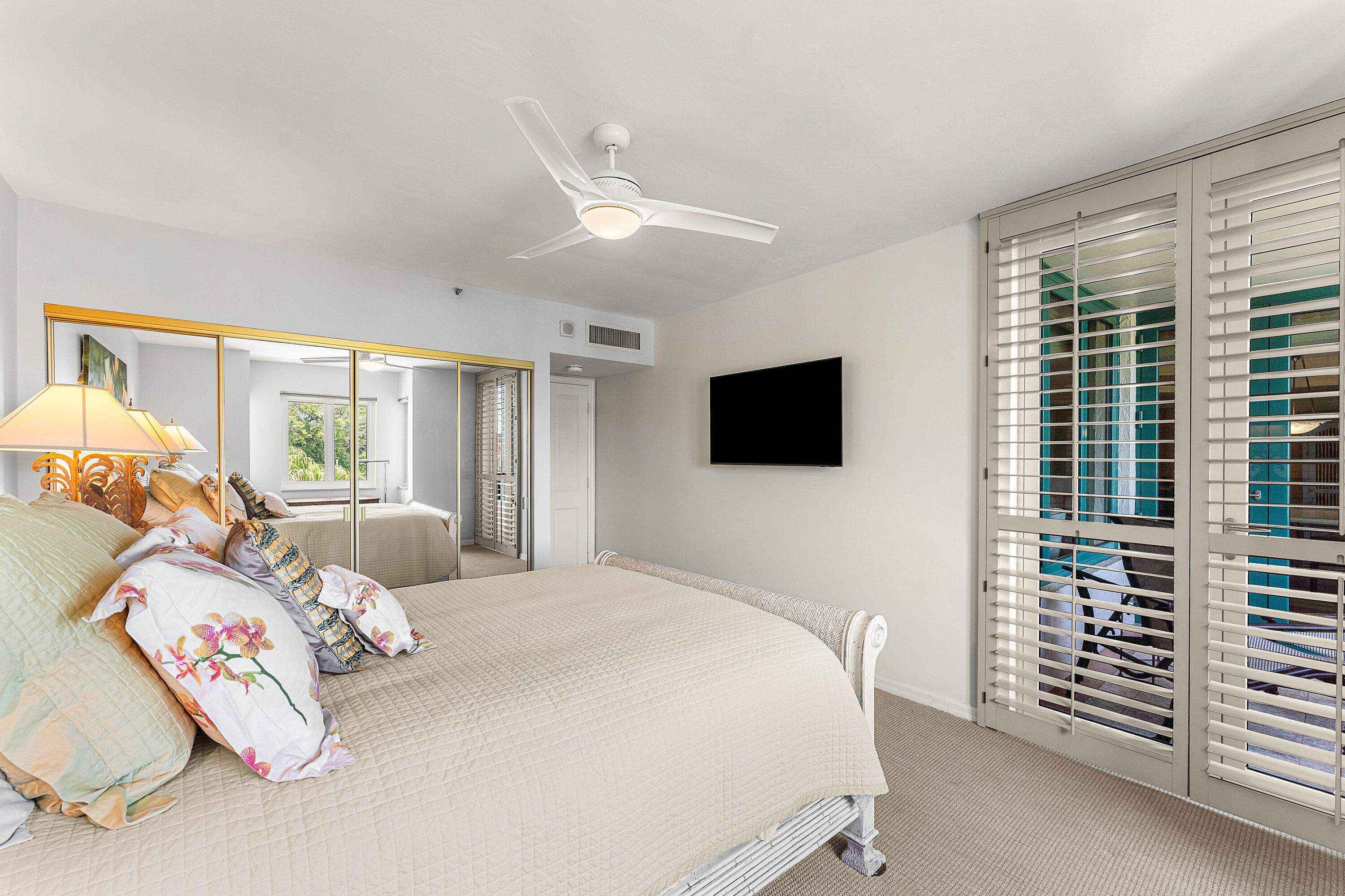 100 Southeast 5th Avenue, Unit 410 Boca Raton, FL 33432 - Photo 33 of 63 a bedroom with a bed and a television