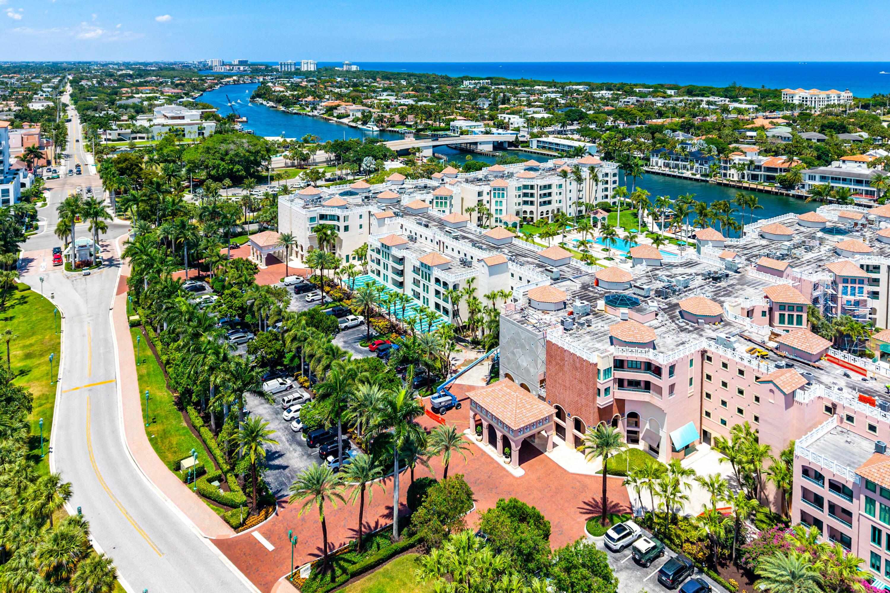 100 Southeast 5th Avenue, Unit 410 Boca Raton, FL 33432 - Photo 46 of 63 an aerial view of a city with lots of residential buildings ocean and mountain view in back