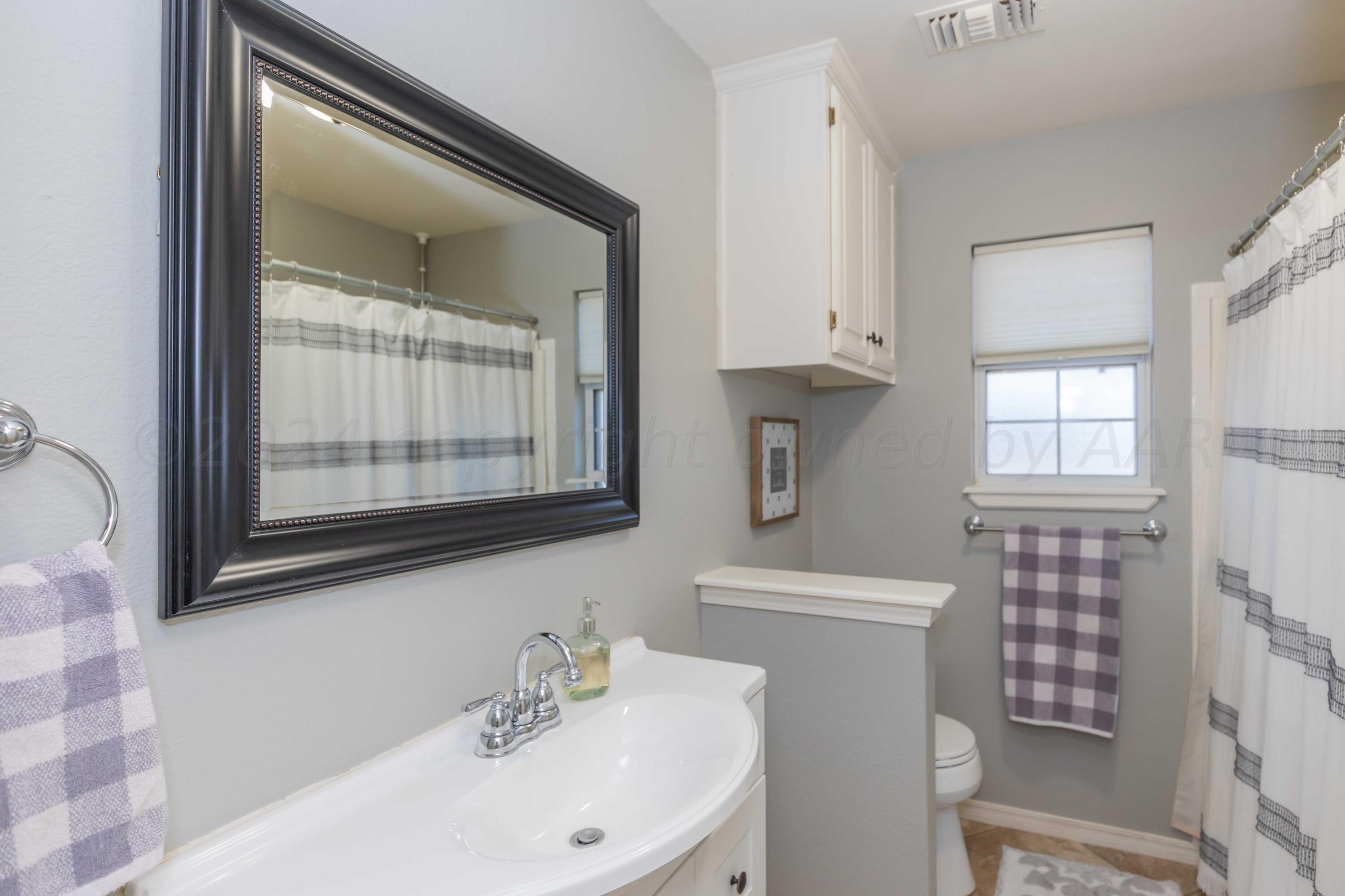 7010 Sunburst Street Amarillo, TX 79110 - Photo 19 of 39 BATHROOM 2 VIEW 1