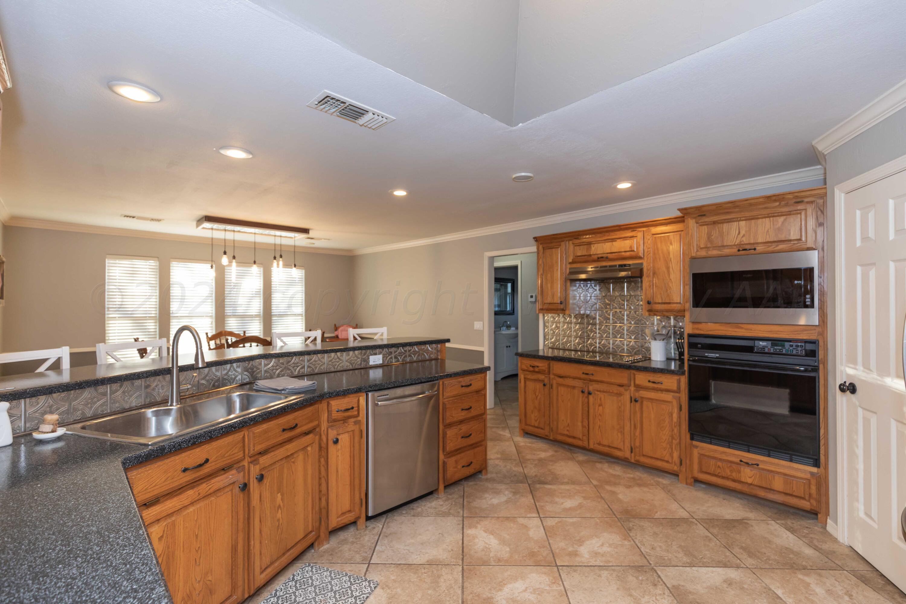 7010 Sunburst Street Amarillo, TX 79110 - Photo 2 of 39 KITCHEN VIEW 4