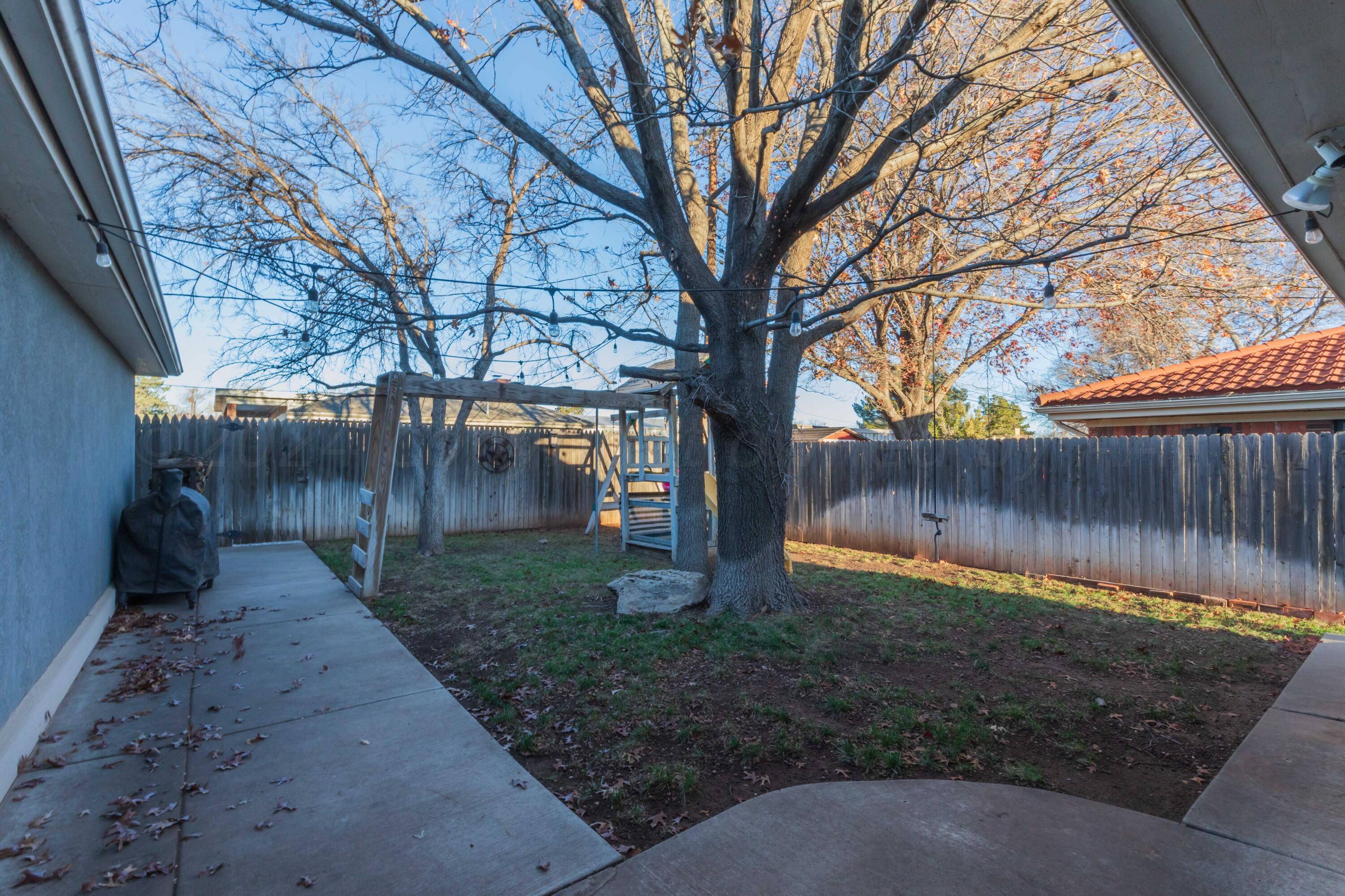 7010 Sunburst Street Amarillo, TX 79110 - Photo 34 of 39 BACKYARD VIEW 1