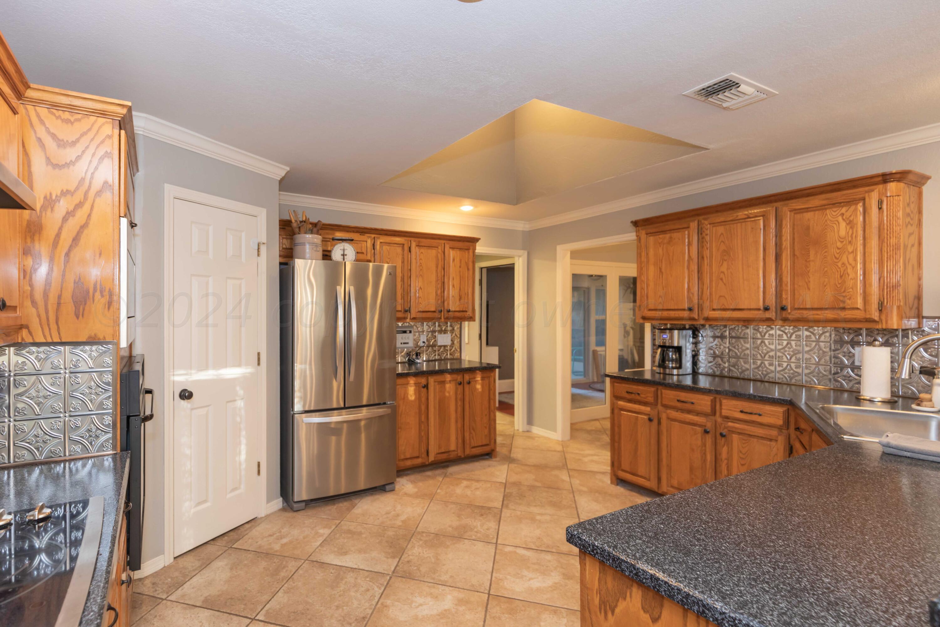 7010 Sunburst Street Amarillo, TX 79110 - Photo 7 of 39 KITCHEN VIEW 1