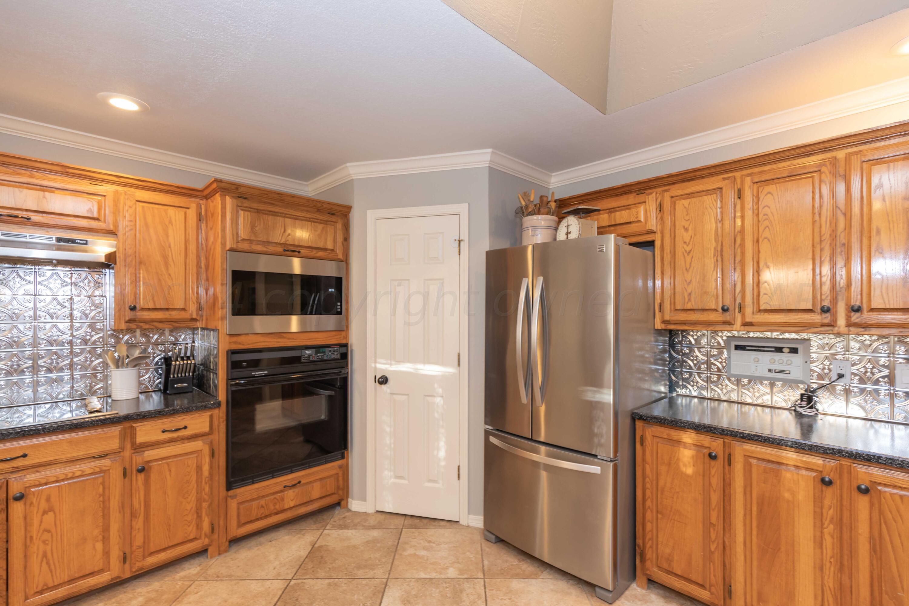 7010 Sunburst Street Amarillo, TX 79110 - Photo 8 of 39 KITCHEN VIEW 3