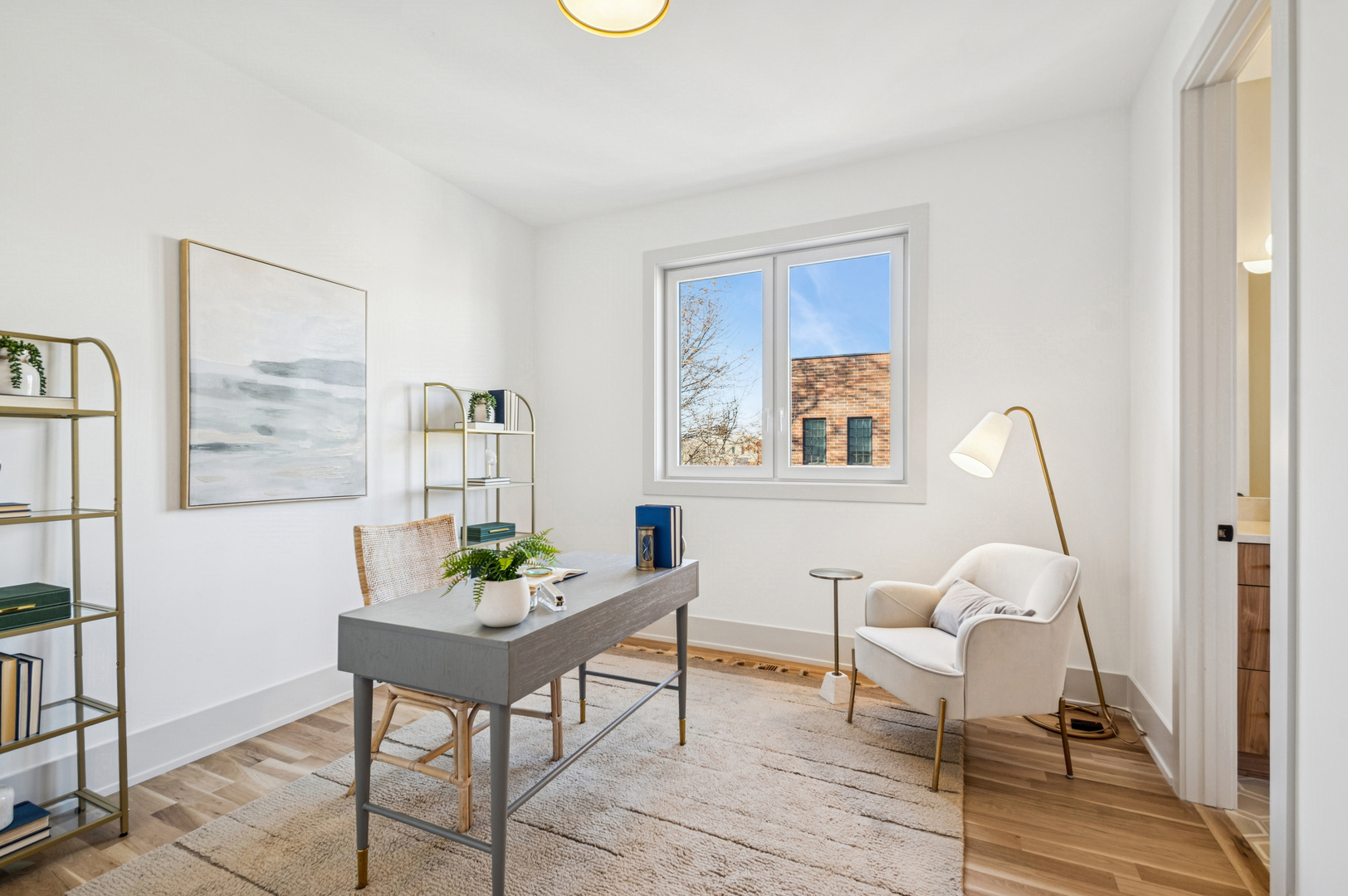 2246 West Lyndale Street, Unit 2 Chicago, IL 60647 - Photo 24 of 27 a living room with furniture and wooden floor