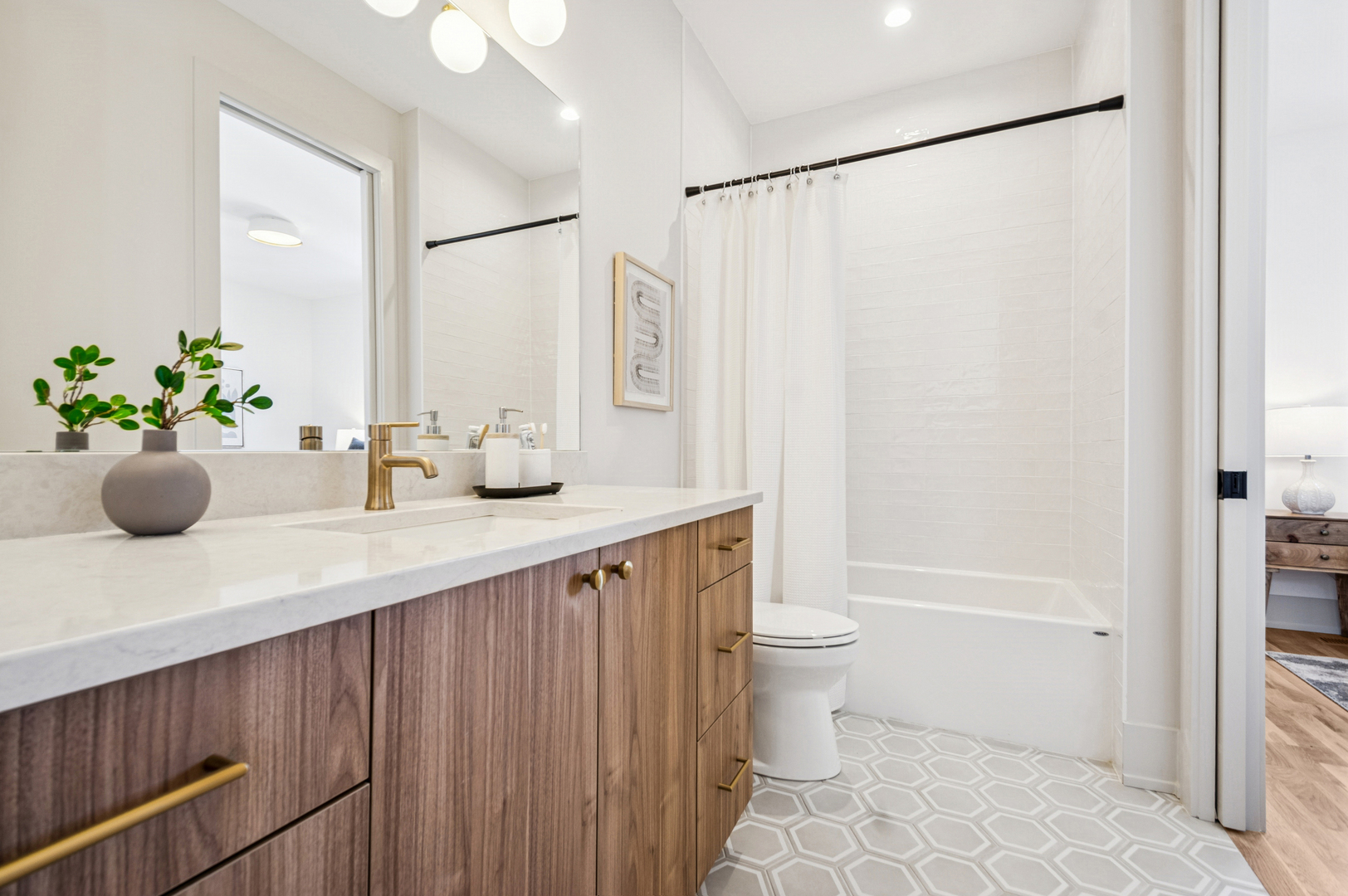 2246 West Lyndale Street, Unit 2 Chicago, IL 60647 - Photo 25 of 27 a bathroom with a sink toilet and shower