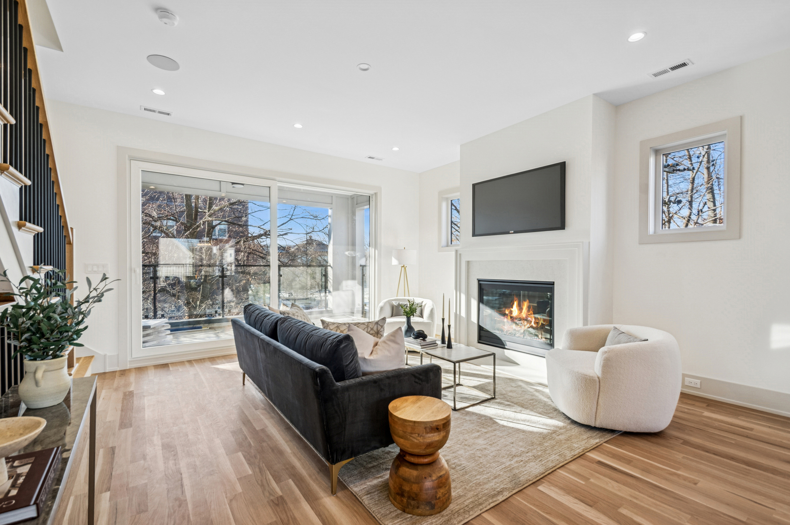 2246 West Lyndale Street, Unit 2 Chicago, IL 60647 - Photo 4 of 27 a living room with furniture and a fireplace