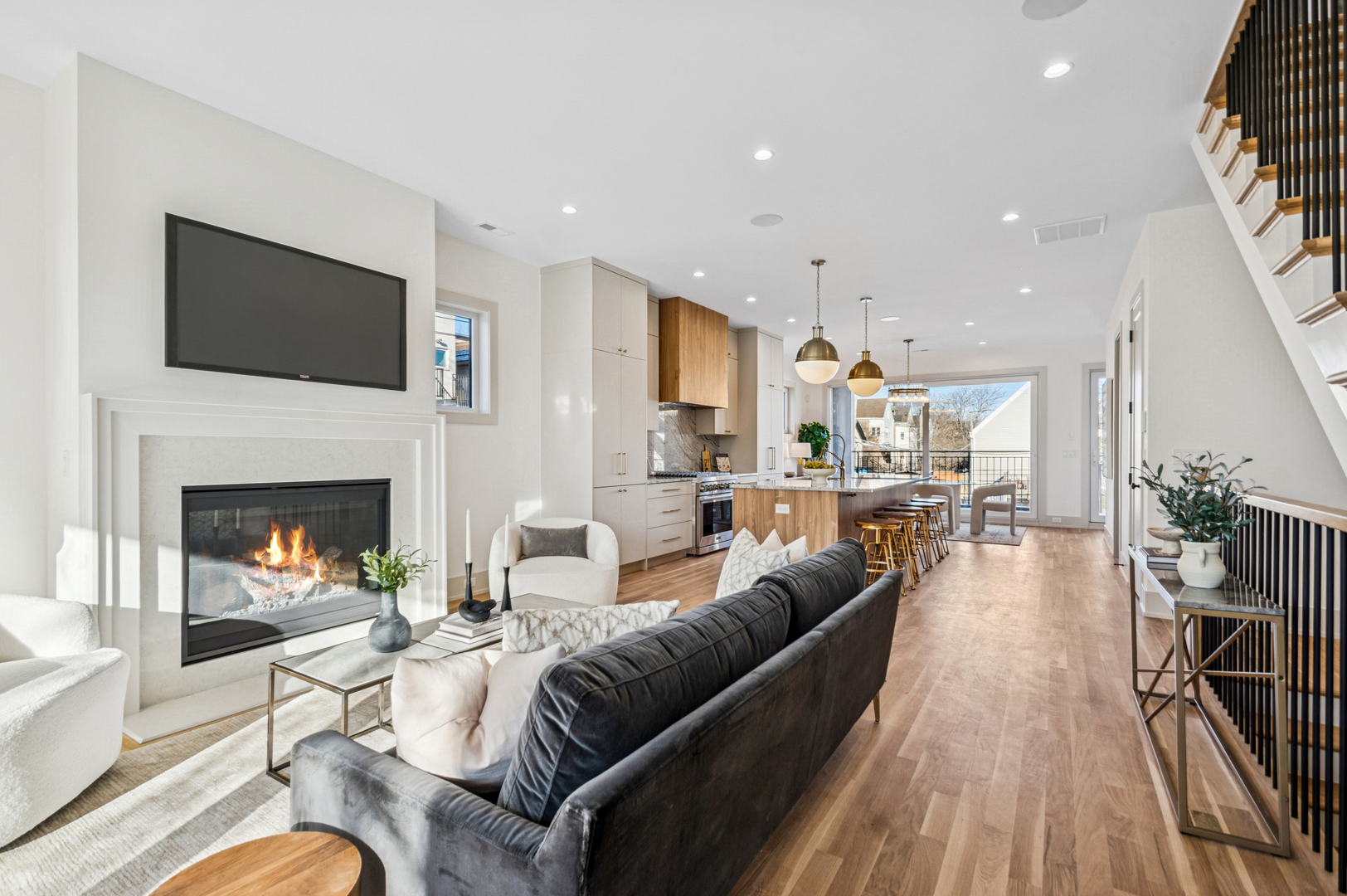 2246 West Lyndale Street, Unit 2 Chicago, IL 60647 - Photo 7 of 27 a living room with furniture and a fireplace