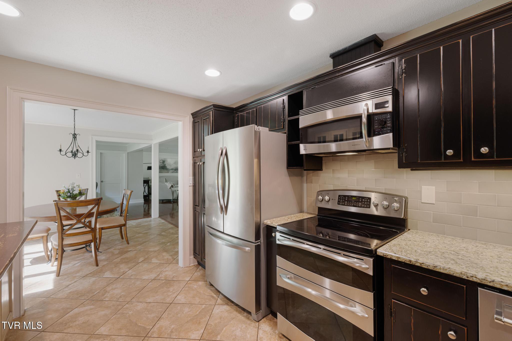 1006 Friar Tuck Road Johnson City, TN 37604 - Photo 37 of 57 Kitchen into dining