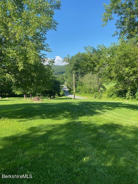 0 Bucklin Road Adams, MA 01220 - Photo 3 of 21 a view of a grassy field with trees