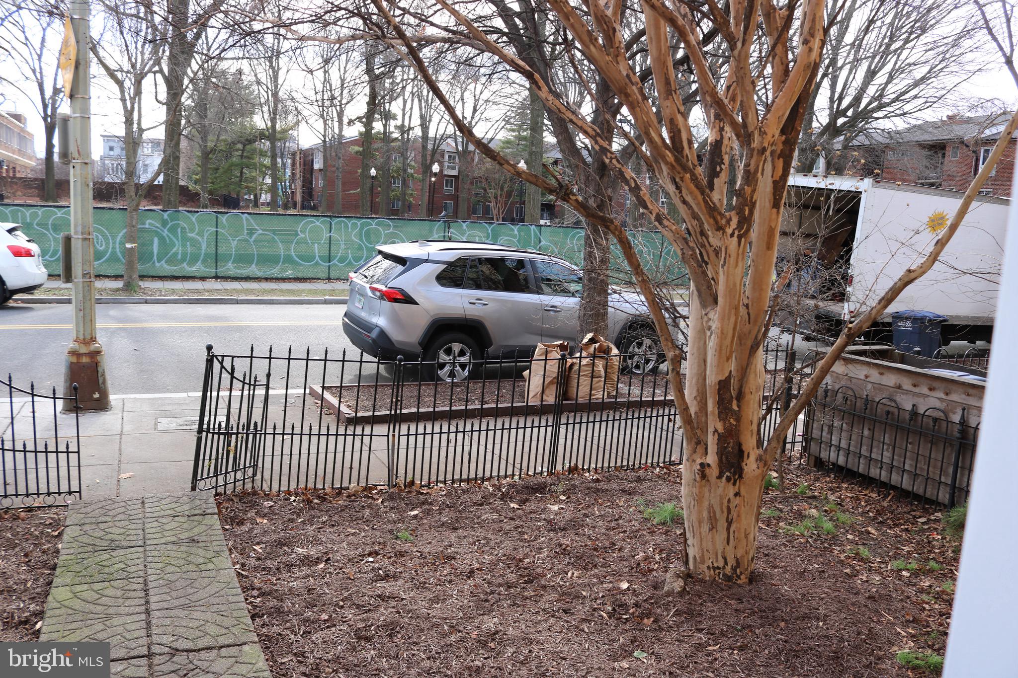 403 O Street Northwest Washington, DC 20001 - Photo 4 of 33 a view of a yard with wooden fence