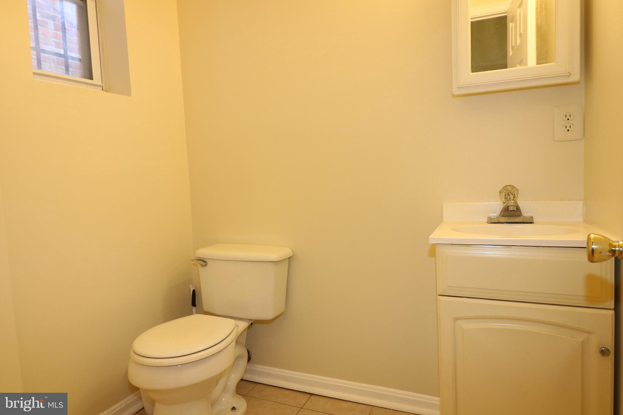 403 O Street Northwest Washington, DC 20001 - Photo 10 of 33 a bathroom with a sink and a toilet
