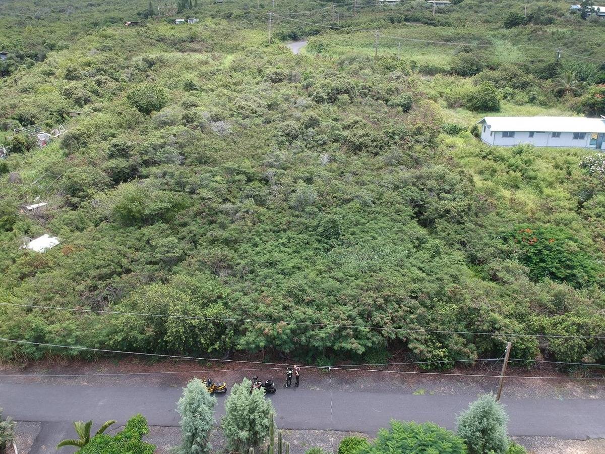 2 Lehua Road Captain Cook, HI 96704 - Photo 4 of 11 a view of a lake with large trees